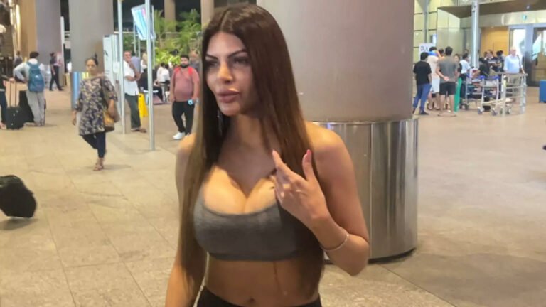 Sizzling Hot Sherlyn Chopra Expresses Embarrassment as Paparazzi Capture Her at the Airport