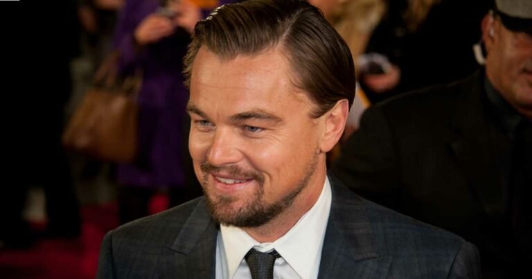 Leonardo dicaprio terrifies woman by transforming into aboriginal creature with mud as a kid.