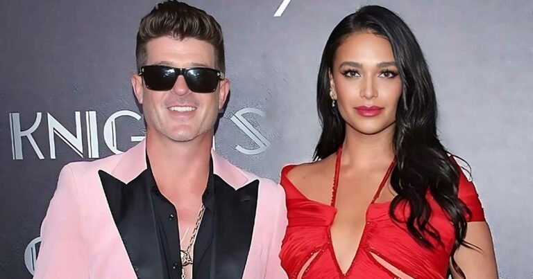 Robin thickes embarrassing behavior with fiancé april love geary in front of paparazzi after getting drunk and stumbling while trying to reenter the lounge.